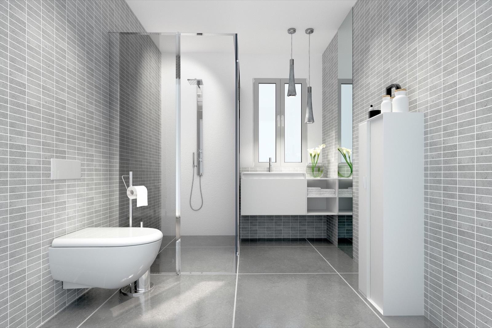 Modernes Badezimmer mit grauen Mosaikwandfliesen und großformatigen Bodenplatten, Walk-in-Dusche und schwebendem Waschtisch